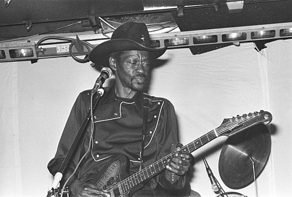 Clarence "Gatemouth" Brown playing guitar on stage in Norway (1981)