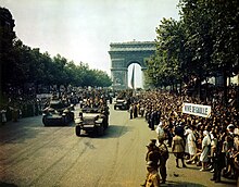 Allied victory parade August 23, 1944, with IH Half-Tracks Crowds of French patriots line the Champs Elysees.jpg