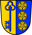 Gemeinde Greußenheim Gespalten von Gold und Blau; vorne ein senkrechter blauer Schlüssel, hinten übereinander drei goldene Rosen.