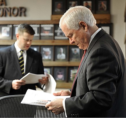 Defense Secretary Robert Gates and McCarthy look over paperwork while visiting Camp Eggers in Kabul on December 8, 2009 Defense.gov photo essay 091208-F-6655M-196.jpg