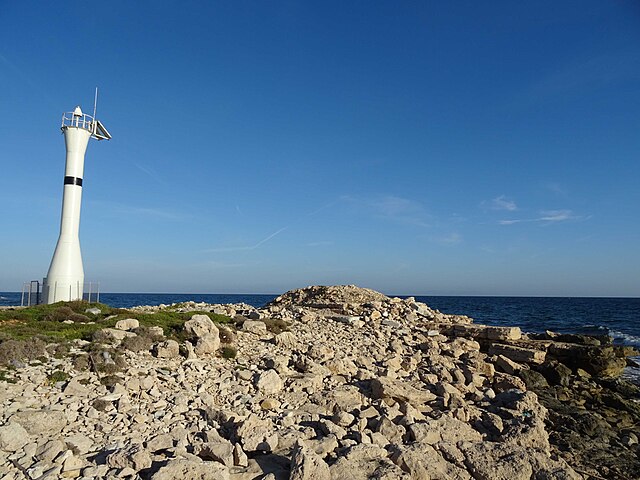 The lighthouse and the remains of the altar of Poseidon