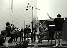 Dren McDonald conducting The String Arcade during a recording session in 2013 in Oakland, CA. Dren McDonald conducting The String Arcade.jpg