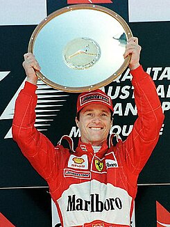 Eddie Irvine după Marele Premiu al Australiei din 1999.jpg