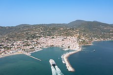 Ferry arriving in Skopelos Harbor, Greece (51696016893).jpg