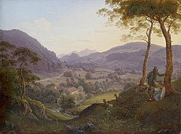 Paysage de montagne avec un jeune couple aux environs de Salzbourg.