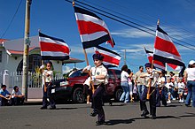 Girls in parade with the Costa Rican flag Girls with Costa Rica flags.jpg