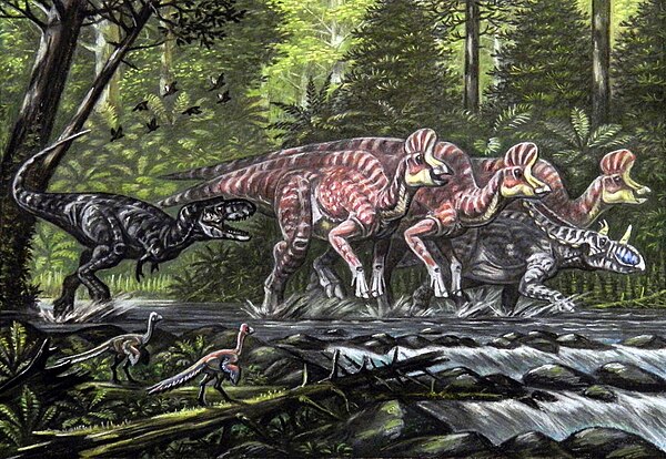 Restoration of Caenagnathus (foreground left) with dinosaurs of the Dinosaur Park Formation