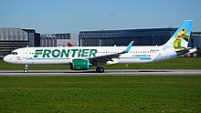 A Frontier Airbus A321neo in one of the airline's many animal liveries, with this tail featuring the coqui llanero (pictured in 2023) Hamburg Finkenwerder Airport Frontier Airlines Airbus A321-271NX N611FR (DSC02811).jpg