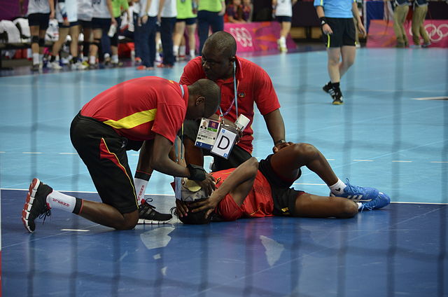 A player down during a match between Angola and Great Britain.