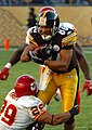 The Chiefs defense takes on running back Hines Ward
