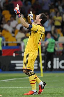 Iker Casillas, as captain of the Spain national football team, wearing a captaincy armband on his left arm Iker Casillas Euro 2012 final 03.jpg