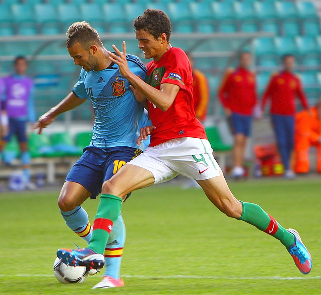 Jesé guarding the ball from Tiago Ilori. His ability to retain possession has led to comparisons with Cristiano Ronaldo.