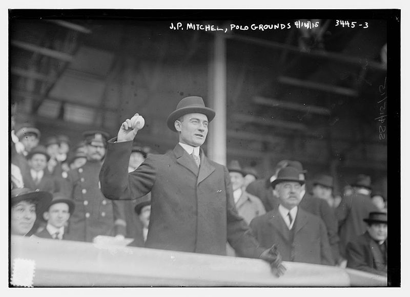 File:John Purroy Mitchel wearing his Homburg hat at the Giants game at the Polo Grounds on April 14, 1915 throwing out the ceromonial first pitch.jpg