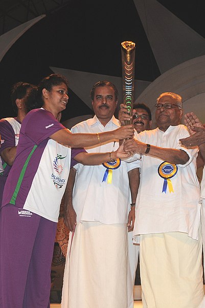 File:K.M Beenamol hands over the Queen’s Baton to the Chief Minister of Kerala - 2010 (cropped).jpg