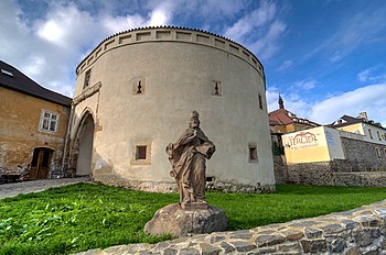 Socha svatého Vojtěcha před Barbakanem Žatecké brány