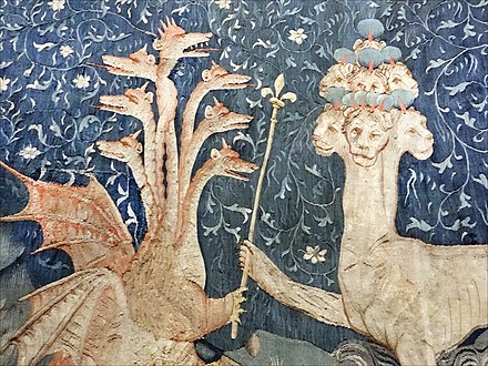 Satan (the dragon; on the left) gives to the beast of the sea (on the right) power represented by a sceptre in a detail of panel III.40 of the medieval French Apocalypse Tapestry, produced between 1377 and 1382.