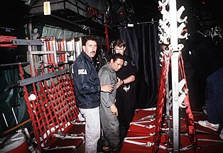 Manuel Noriega with agents from the U.S. DEA.jpg