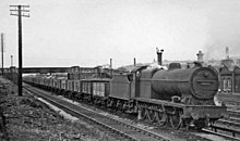 49560 with a typical freight duty in 1950 Mirfield eastbound empties geograph-2785124-by-Ben-Brooksbank.jpg