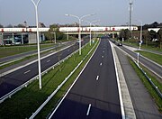 De Bevrijdingslaan N351 t.h.v. het industrieterrein Waggelwater. Kijkrichting: Kristus-Koning en Brugge-centrum.