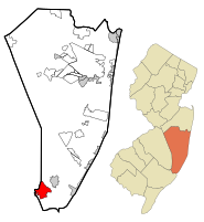 Location of Mystic Island in Ocean County highlighted in red (left). Inset map: Location of Ocean County in New Jersey highlighted in orange (right).