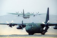Two C-130 Hercules in South Korea, 1984 One U.S. Air Force C-130 Hercules aircraft taxis as another takes off from Yeo Ju airstrip during the joint U.S.-South Korean Exercise Team Spirit '84 DF-ST-84-11567.jpg