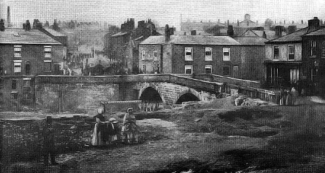 The earliest known photograph of Radcliffe Bridge district, taken by William Smith in 1854. The belfry of the original St Thomas' Church is visible on