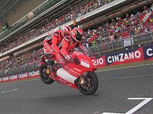 Mamola demonstrating a dual-seater Ducati at Barcelona Randy Mamola Ducati 2006 0618.jpg