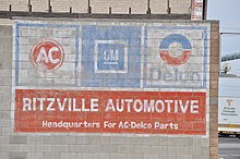 Old GM AC-Delco ad on the side of a building in Ritzville, Washington, U.S. Ritzville, WA - Ritzville Automotive 02.jpg