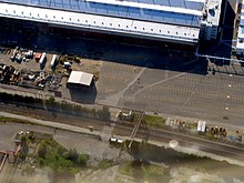 Aerial view of part of the River Works property in July 2016 with the station at bottom center River Works aerial photo, July 2016.JPG