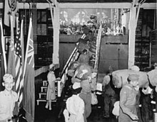 Debarking the SS Cody Victory at Pier 8, Hampton Roads, in 1945 with 2,032 troops from Leghorn and Naples, Italy SS Cody Victory Pier8 Hampton Roads 1945.jpg