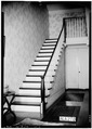 STAIR AND DOOR TREATMENT IN S. END OF HALL - C. W. Dunlap House, 237 Wilson Avenue, Eutaw, Greene County, AL HABS ALA,32-EUTA,12-3.tif