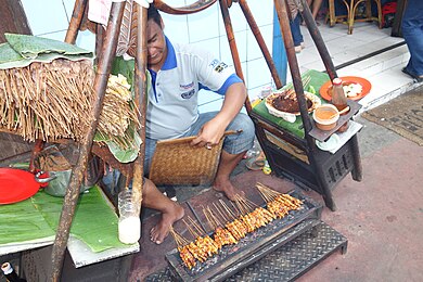 Sate madura being grilled. Sate ayam-Jakarta.JPG