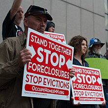 In Minneapolis, Hennepin County community members protest to demand accountability from the banking industry, following the 2008 recession. May 21, 2013. Stop Evictions.jpg