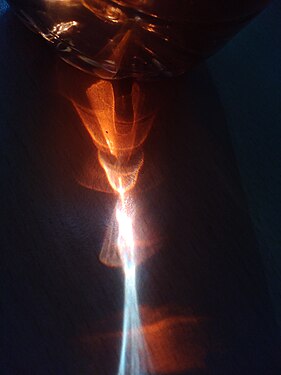 Light refraction through a bottle of tea