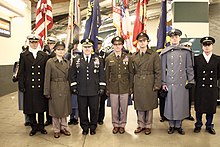 General Milley stands with Sergeant Major of the Army Daniel A. Dailey and soldiers modelling the proposed "Pinks and Greens" uniform. The Proposed Pink & Green Uniform Makes It's National Debut at the 2017 Army-Navy Game 171212-Z-IF359-006.jpg