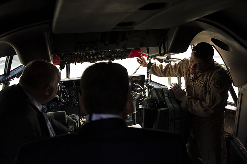 File:U.S. Air Force Capt. Brendan Duffy, right, a pilot assigned to the 143rd Airlift Wing, Rhode Island Air National Guard and deployed with the 737th Expeditionary Airlift Squadron, talks with guests touring an Air 140116-F-IG195-097.jpg