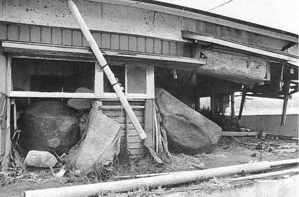 House destroyed and partially buried by lahars in the Mizunashi River valley, 1994