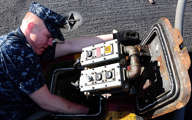 File:US Navy 101109-N-1276B-054 Aviation Ordnanceman Airman Evan D. Miner, from Dollar Bay, Mich., performs a semi-annual maintenance check on an upper.jpg