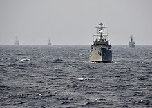 CARAT Bangladesh 2011 (Sep. 22, 2011) US Navy 110922-N-RI844-021 Bangladesh navy and U.S. Navy ships participate in a surface gunnery exercise during Cooperation Afloat Readiness and Tr.jpg