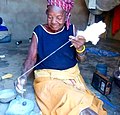 Woman in Cotton Processing, Northern Ghana