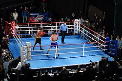LA Matadors vs. Moscow Dynamo in Hollywood, CA on 4 December 2011. Both amateur boxers compete without vests or head guards. World Series Boxing Ring.JPG