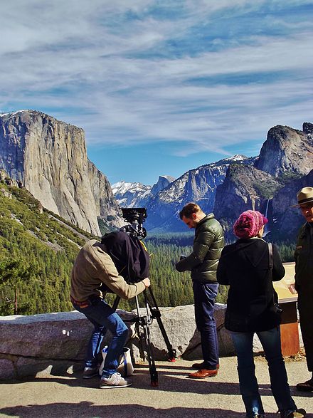 A travel channel filming the Yosemite Valley