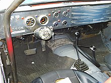 Quick release hub and the detached steering wheel on the floor, used mainly in race cars 1974 AMC Matador grand national int.jpg