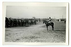 In a bit of reverse colonialism, African Spahis (on horseback) of the French army guard a column of Republican refugees. 22NUM27FI73 (Les spahis surveillent la file des refugies.).jpg