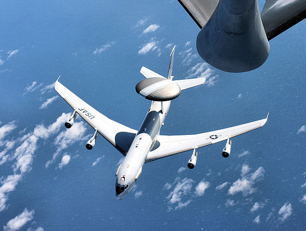 An E-3 Sentry airborne warning and control system aircraft breaks away from a Mississippi Air National Guard KC-135 Stratotanker during a presidential