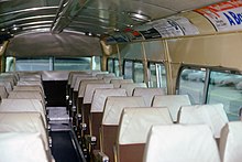 "Suburban" interior with high-back seats and "dropped" center floor AC Transit, GM New Look as delivered suburban with high back seats ACT105 (11177858734).jpg