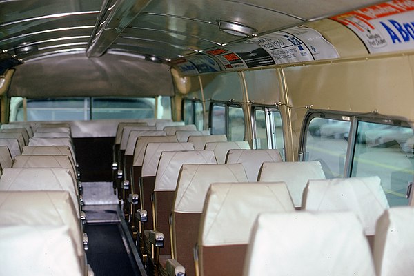 "Suburban" interior with high-back seats and "dropped" center floor