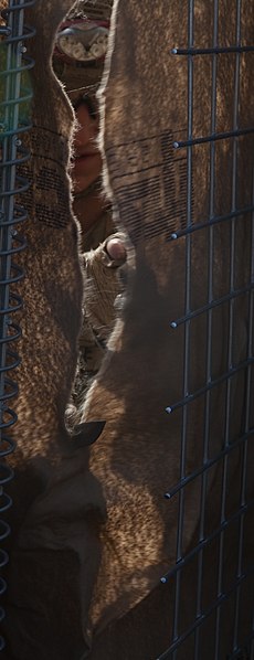 File:A U.S. Soldier cuts a HESCO barrier to fit a gap during strongpoint construction at Zharay district, Kandahar province, Afghanistan, Feb 120209-A-QD683-056.jpg