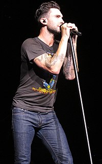 Adam Levine and his group Maroon 5 scored a major comeback hit this year with "Moves Like Jagger". The song, a collaboration with Christina Aguilera, became the UK's second best seller of the year, with 16 consecutive weeks in the top 10, including seven straight weeks at number two. It is the highest-selling song not to peak at number-one in the UK, with over 1.5 million copies sold there. Adam Levine 2013 August (cropped).jpg