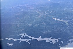 Aerial view of the southern shore of Talang Reservoir near Terachi, Negeri Sembilan, where the Muar River originated. Aerial of Negeri Sembilan 2023 01.jpg